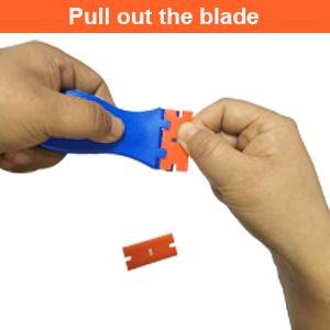 Removing a used plastic razor blade from the scraper tool