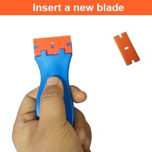 Inserting a replacement plastic razor blade into the scraper tool